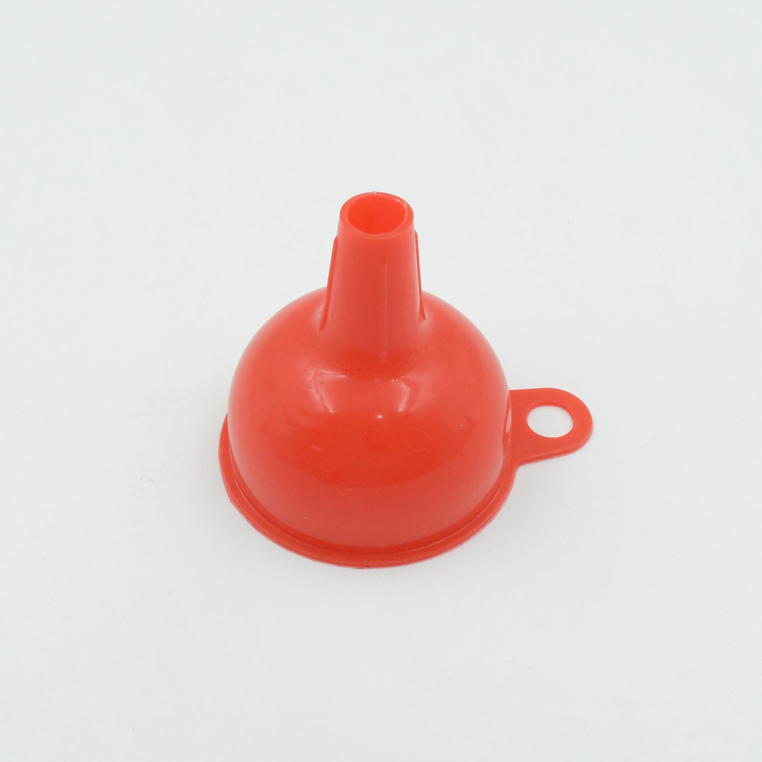 Silicone funnel in use for pouring liquids and grains