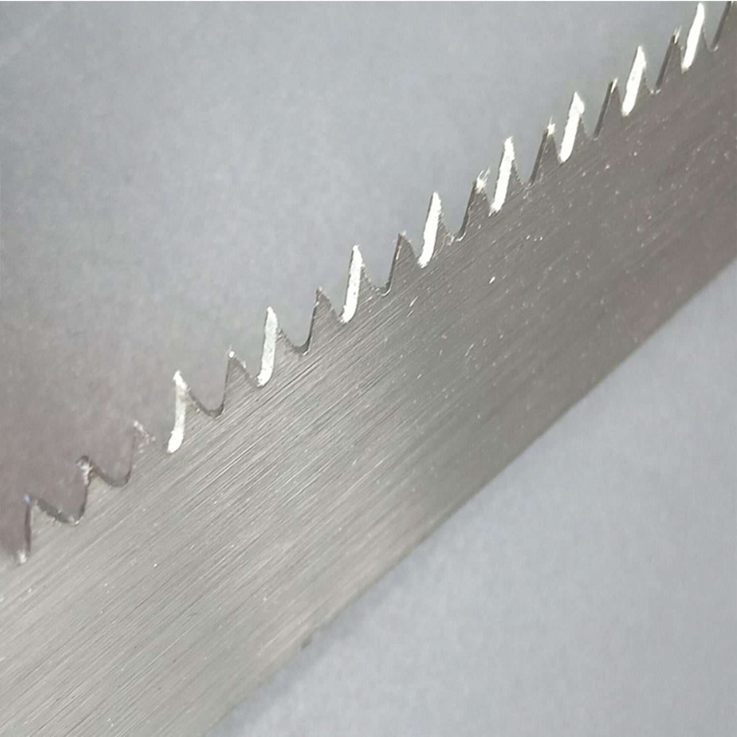 Pruning saw with handle close-up.