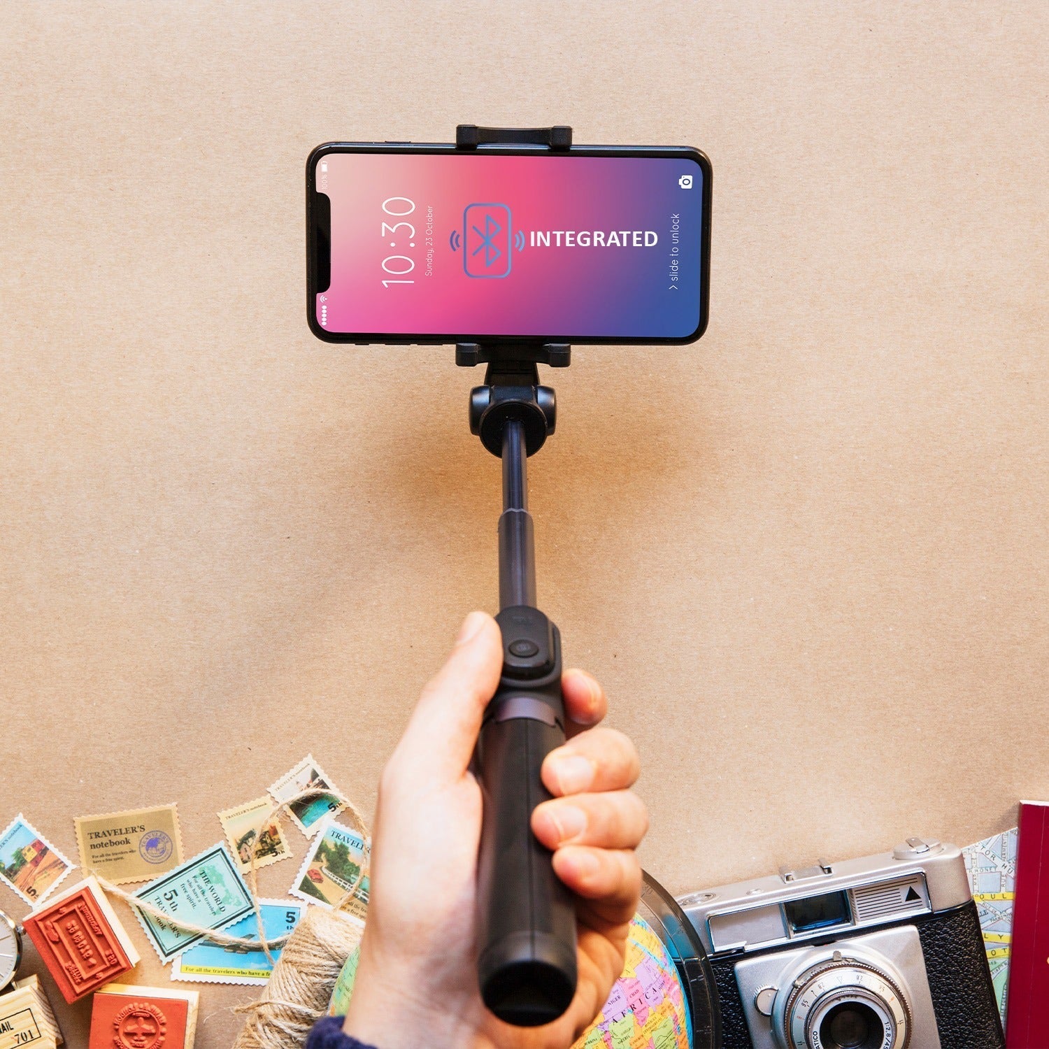 Folded selfie stick with phone holder and Bluetooth remote